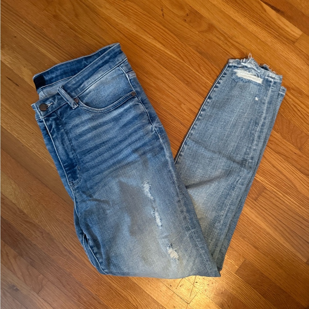 Distressed Blue Denim Jeans